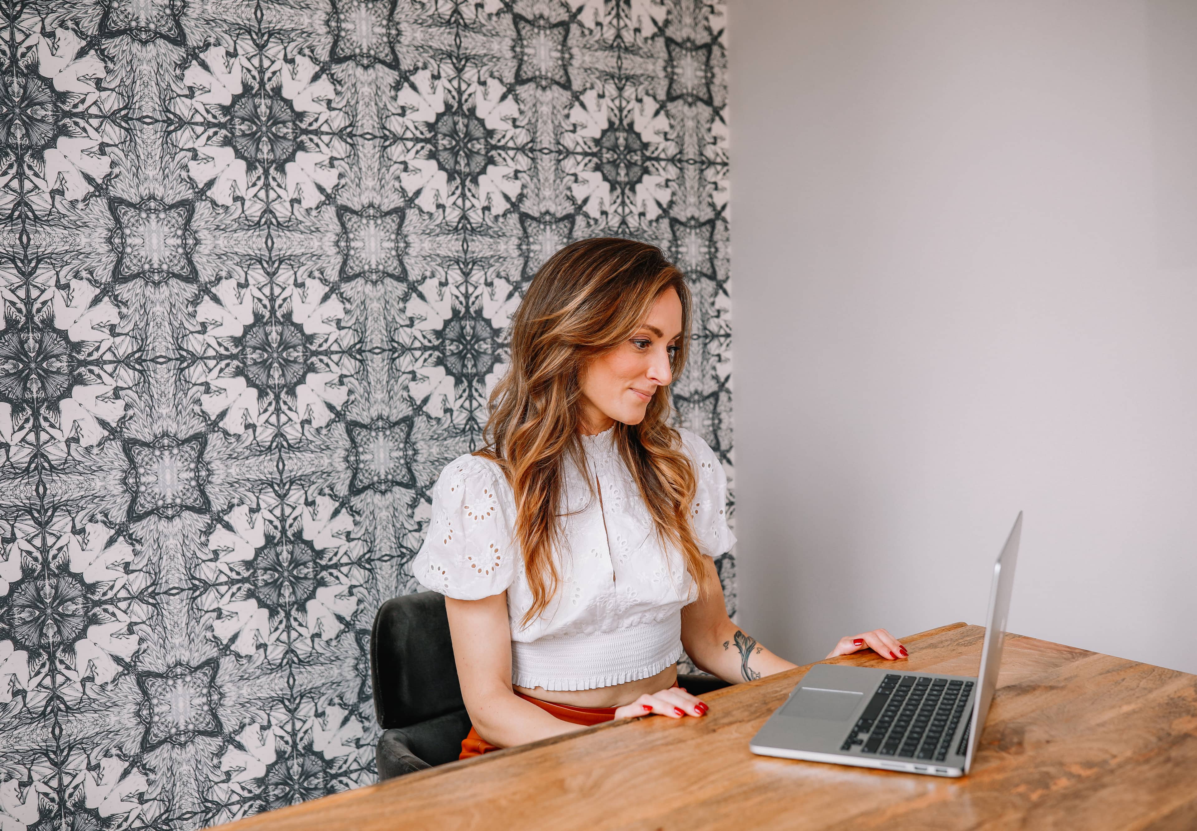 Austin office workspace with desk and laptop